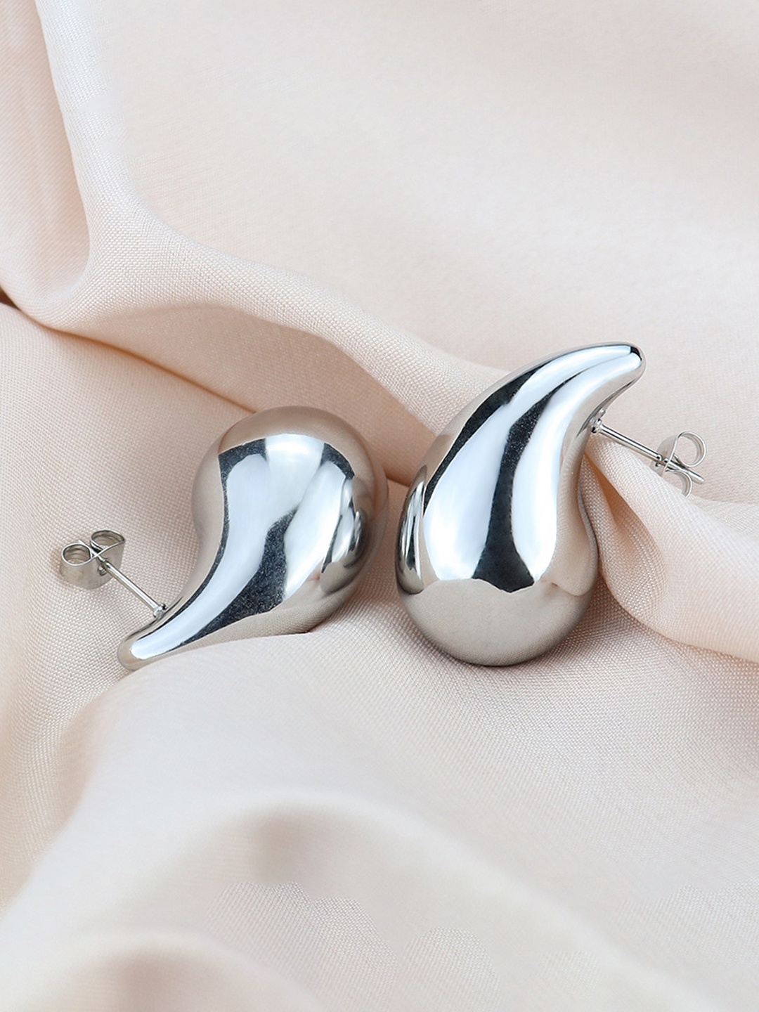

Krelin Silver-Plated Teardrop Shaped Drop Earrings