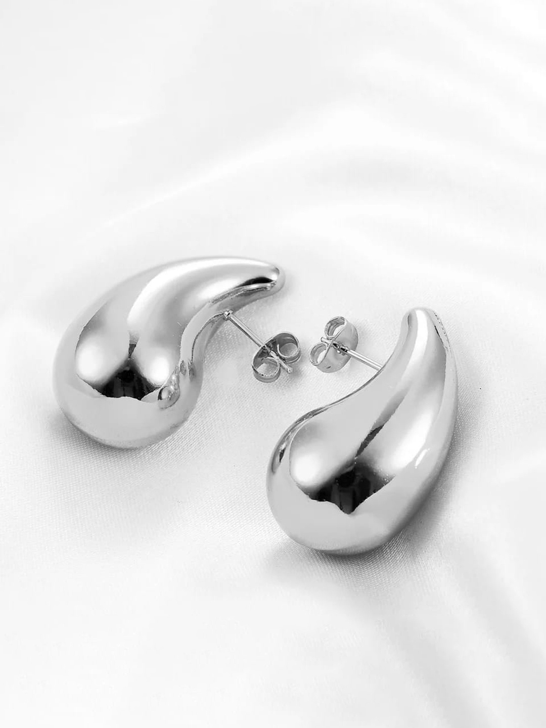 

Krelin Silver-Plated Teardrop Shaped Drop Earrings