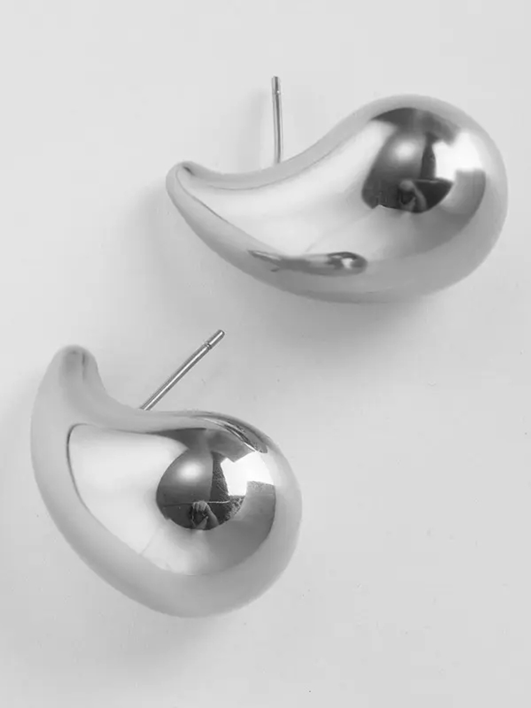 

Krelin Silver-Plated Teardrop Shaped Drop Earrings