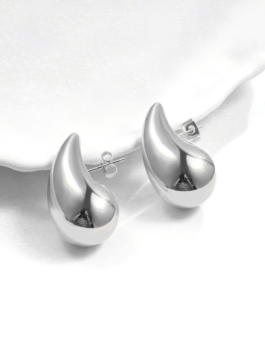 

Krelin Silver-Plated Teardrop Shaped Drop Earrings