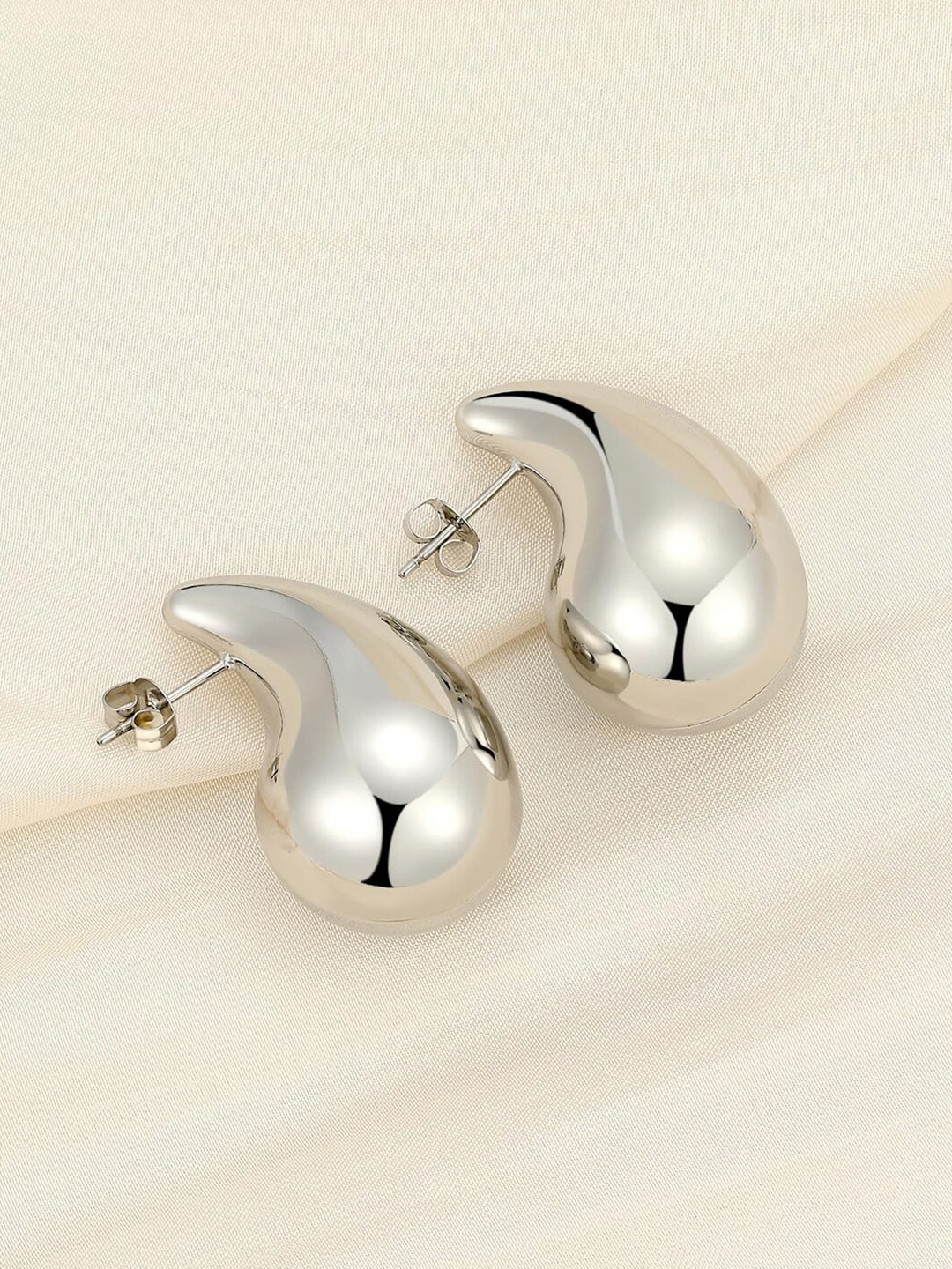 

Krelin Silver-Plated Teardrop Shaped Drop Earrings