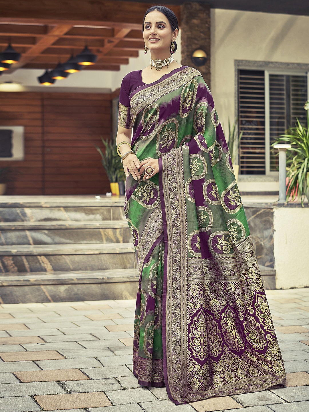 

Mitera Magenta & Green Ethnic Motifs Woven Design Zari Art Silk Saree