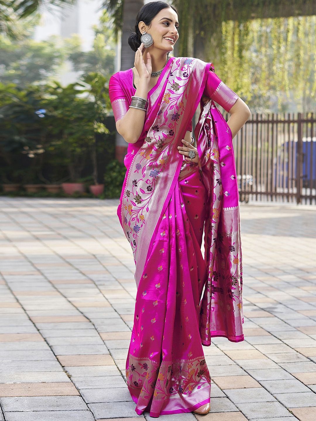 

Mitera Pink & Blue Ethnic Motifs Woven Design Zari Art Silk Saree