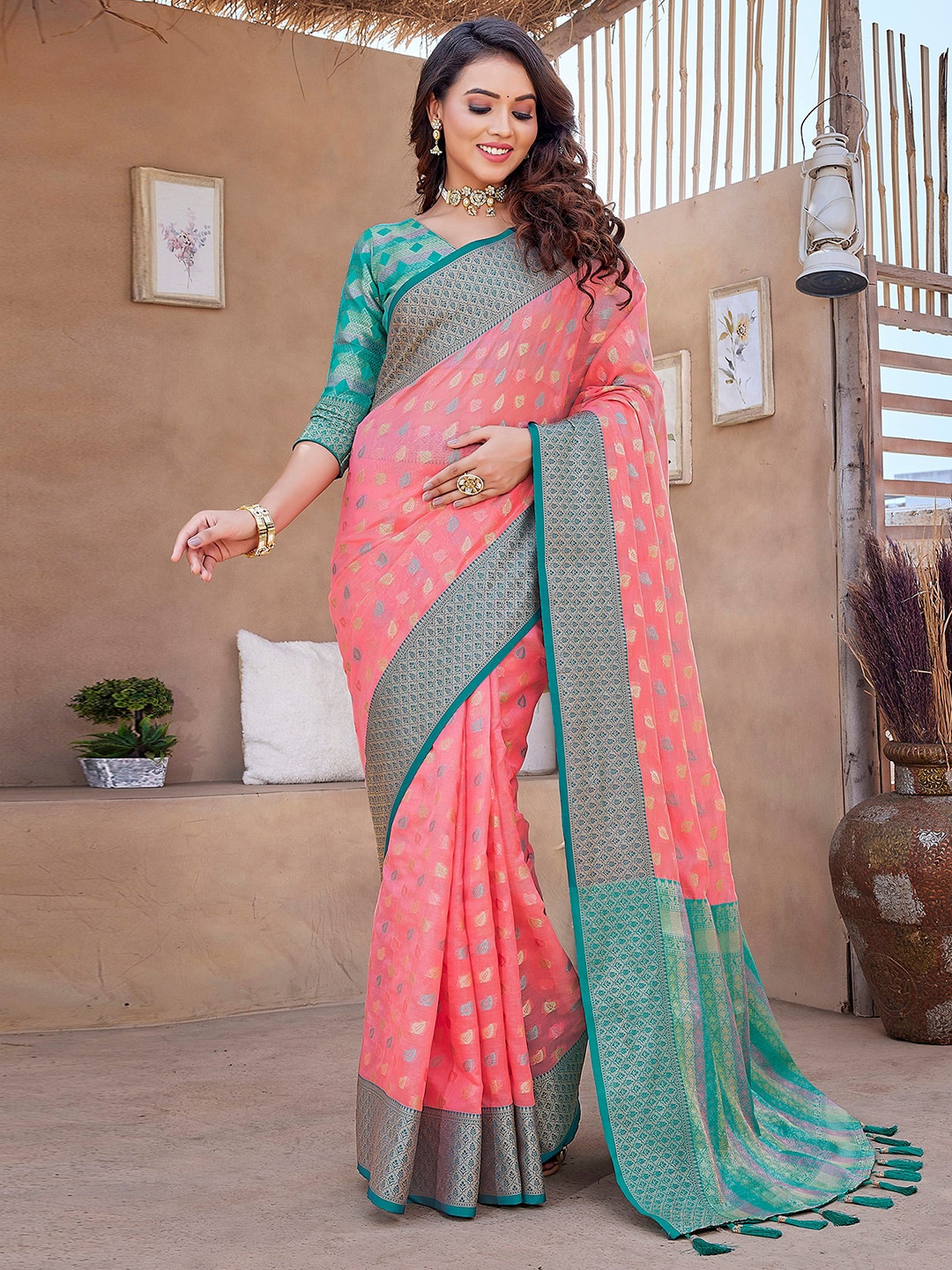 

Mitera Pink & Green Ethnic Motifs Woven Design Zari Organza Saree