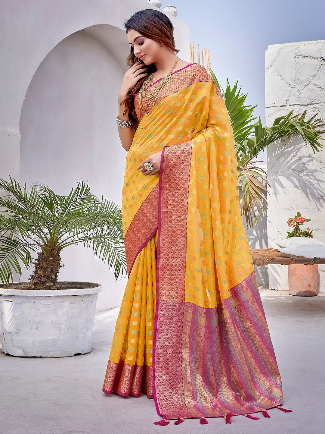 

Mitera Yellow & Pink Ethnic Motifs Woven Design Zari Organza Saree