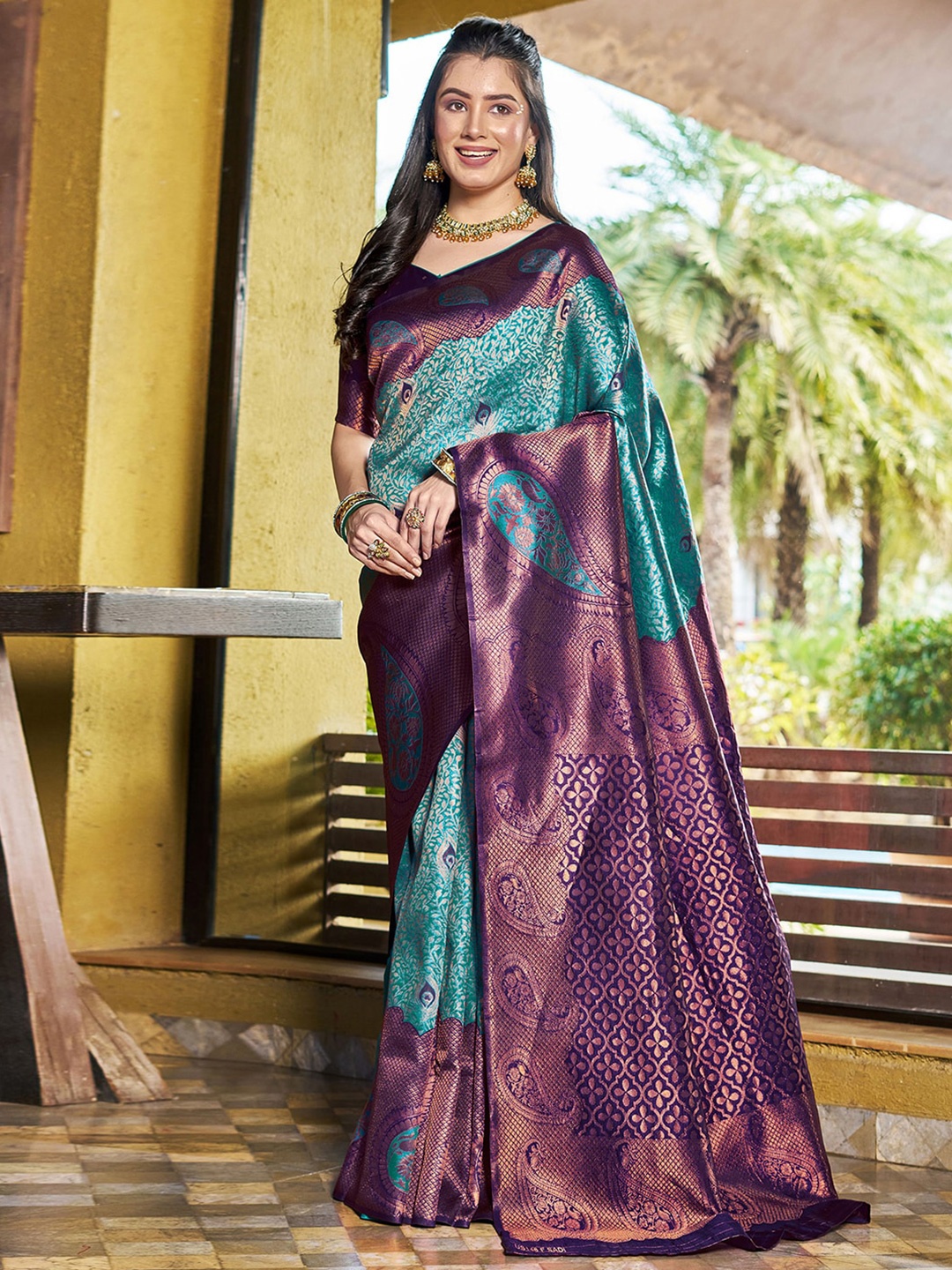 

Mitera Green & Gold Toned Ethnic Motifs Woven Design Zari Art Silk Saree