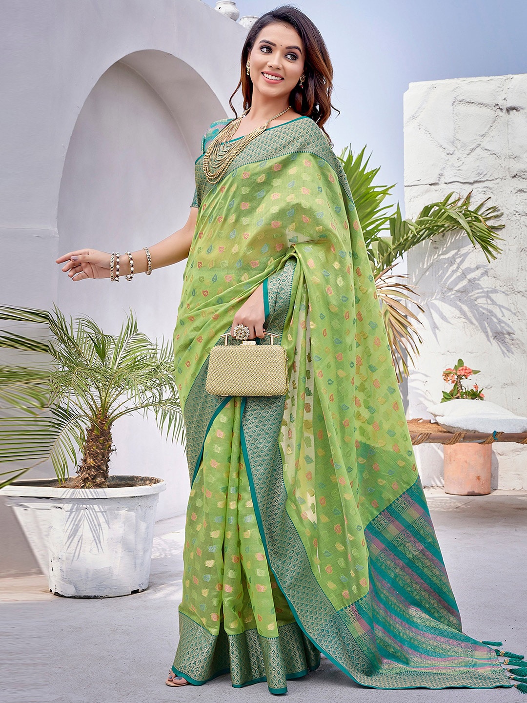 

Mitera Green & Gold Toned Woven Design Zari Organza Saree