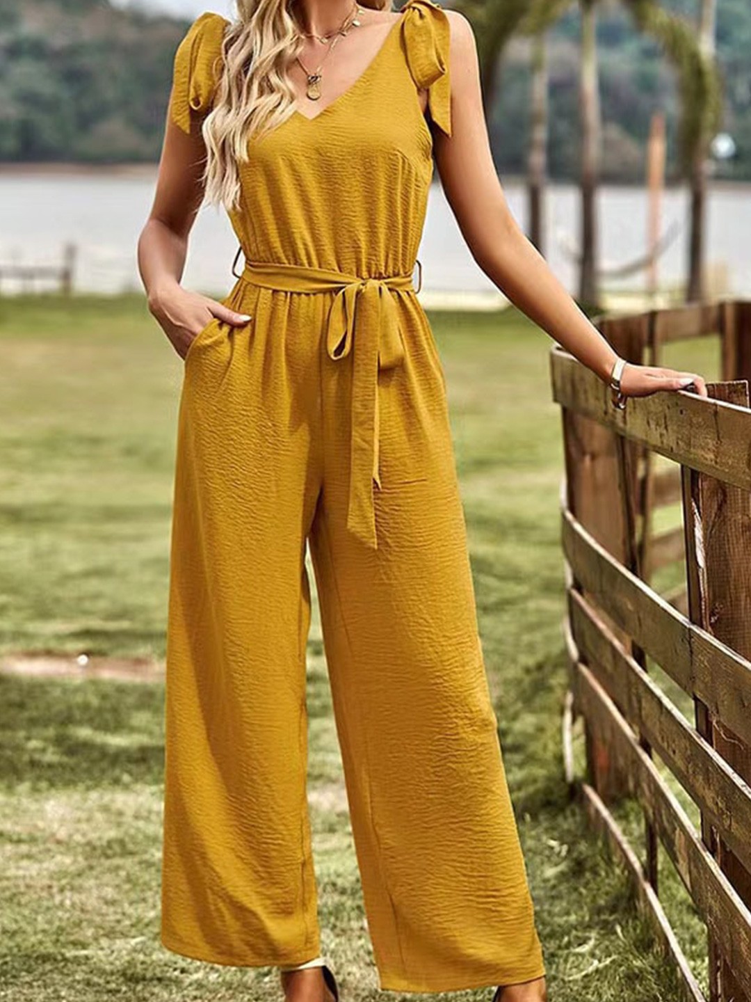 

StyleCast Yellow Sleeveless V-Neck Belted Basic Jumpsuit