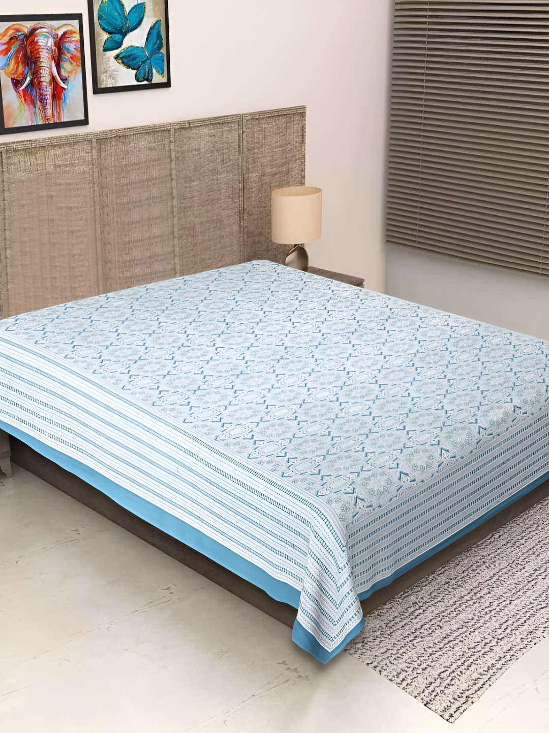 

Texstylers Blue & White Ethnic Motifs Printed Cotton 250 TC Single Bedsheet