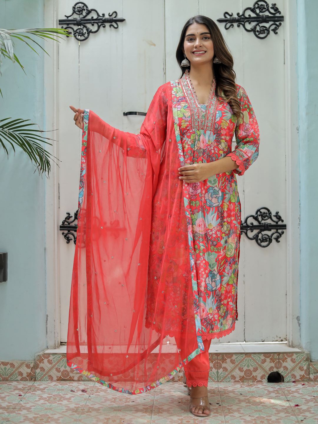 

Chandbaali Floral Printed V Neck Thread Work Kurta with Trousers & With Dupatta, Orange