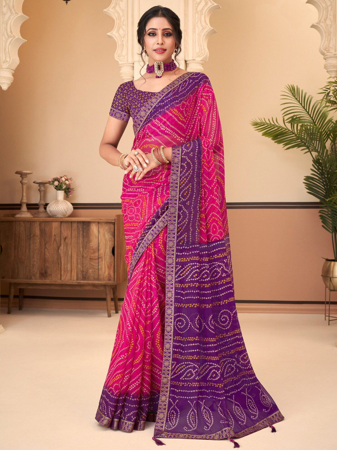 

Anouk Pink & Purple Embellished Bandhani Saree