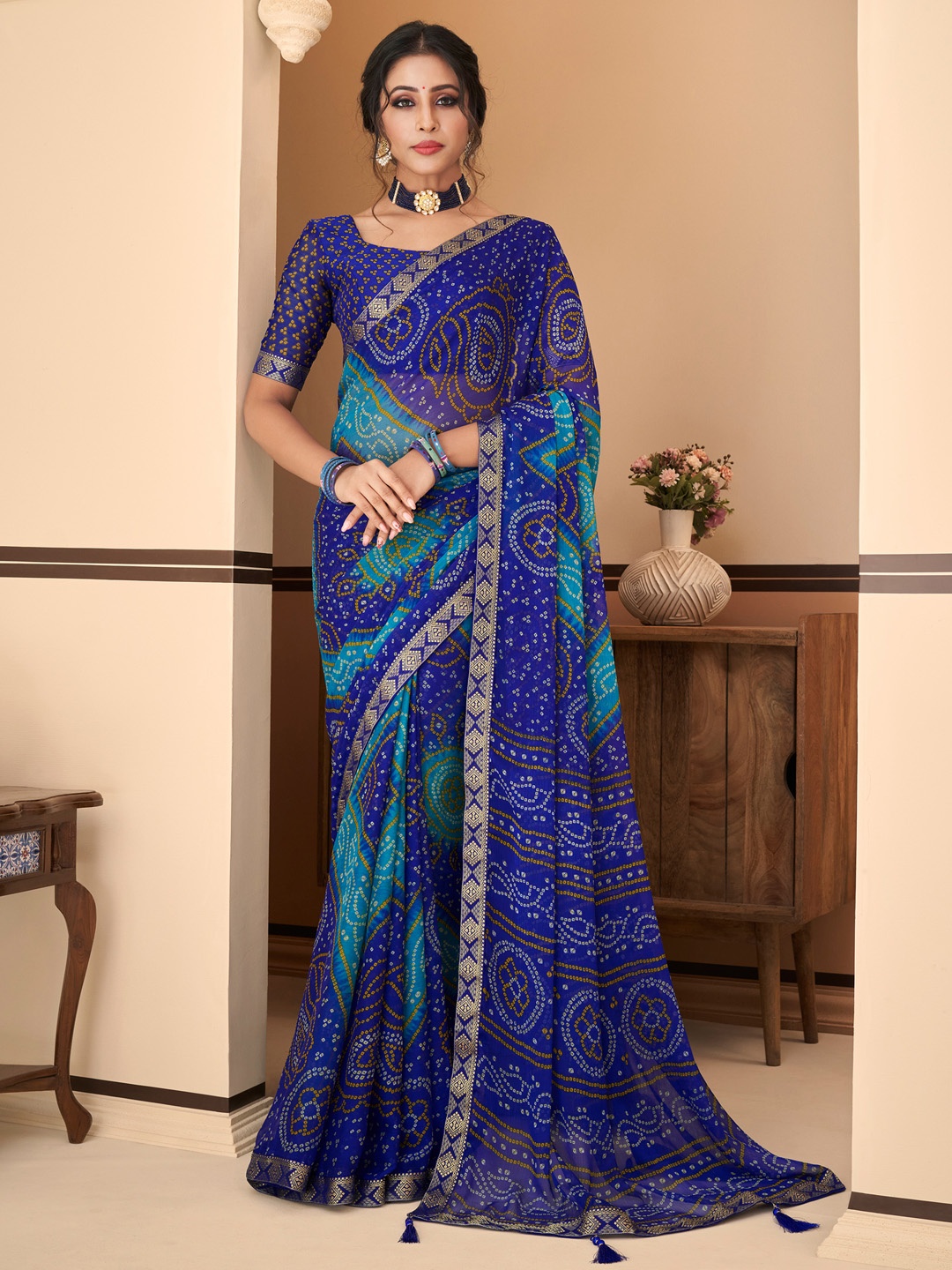 

Anouk Blue & White Bandhani Embroidered Bandhani Saree