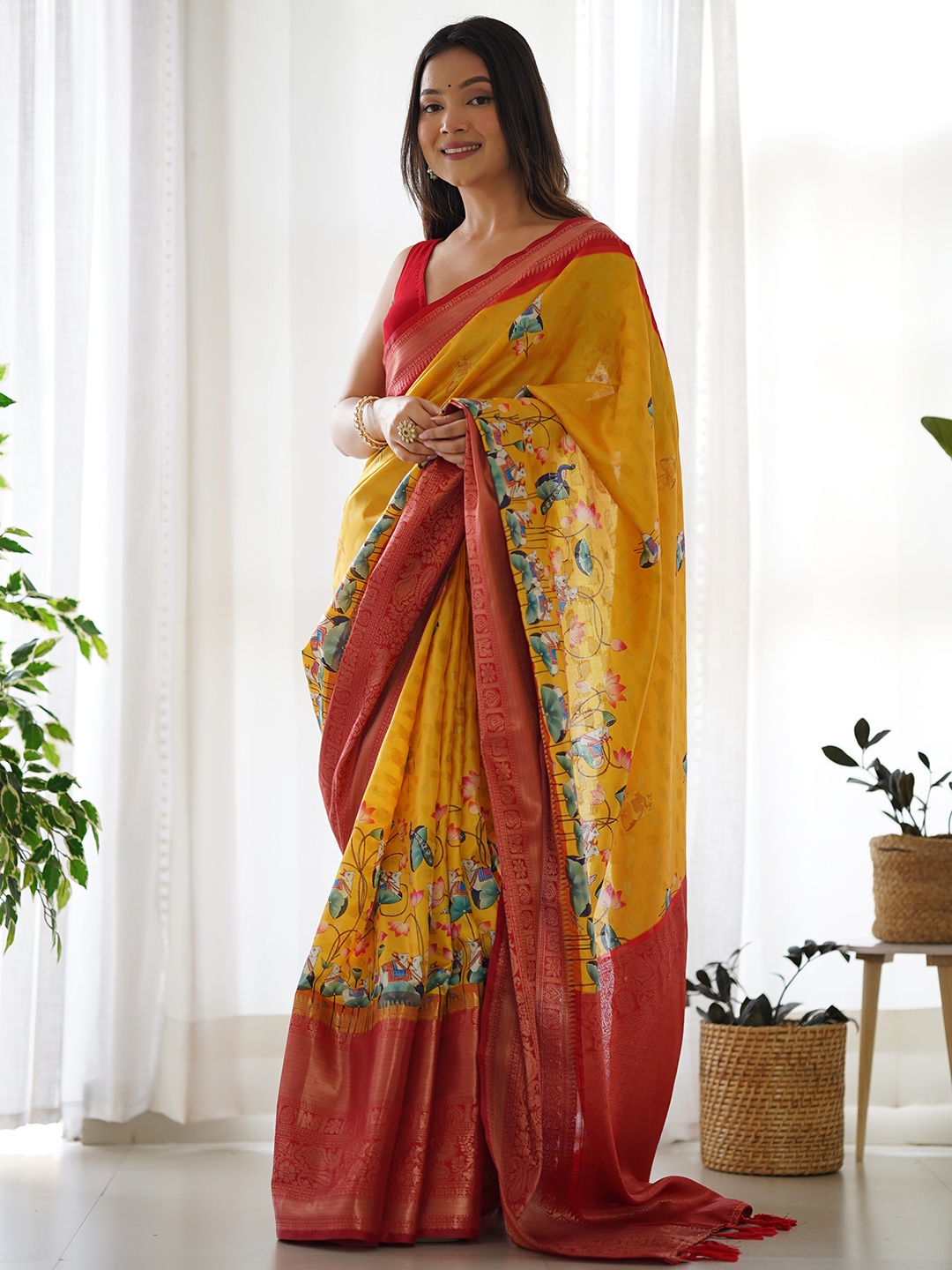 

Anouk Yellow & Gold Toned Kalamkari Zari Saree