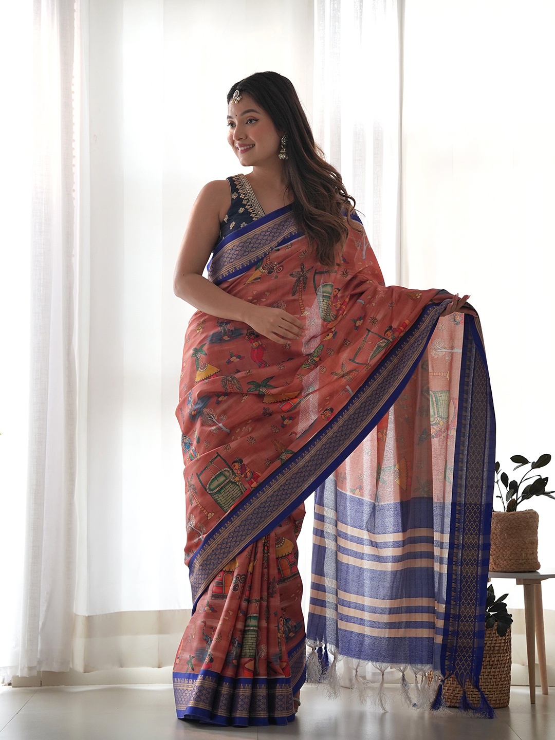 

Anouk Rust & Blue Kalamkari Zari Saree