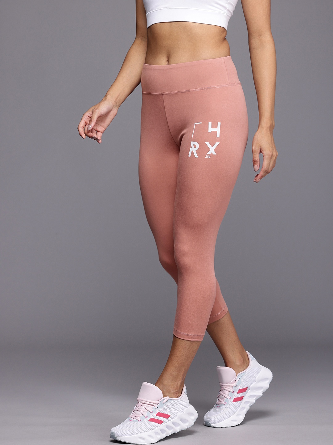 

HRX by Hrithik Roshan Women Togetherfaster Antimicrobial & Rapid Dry Running Tights, Rose