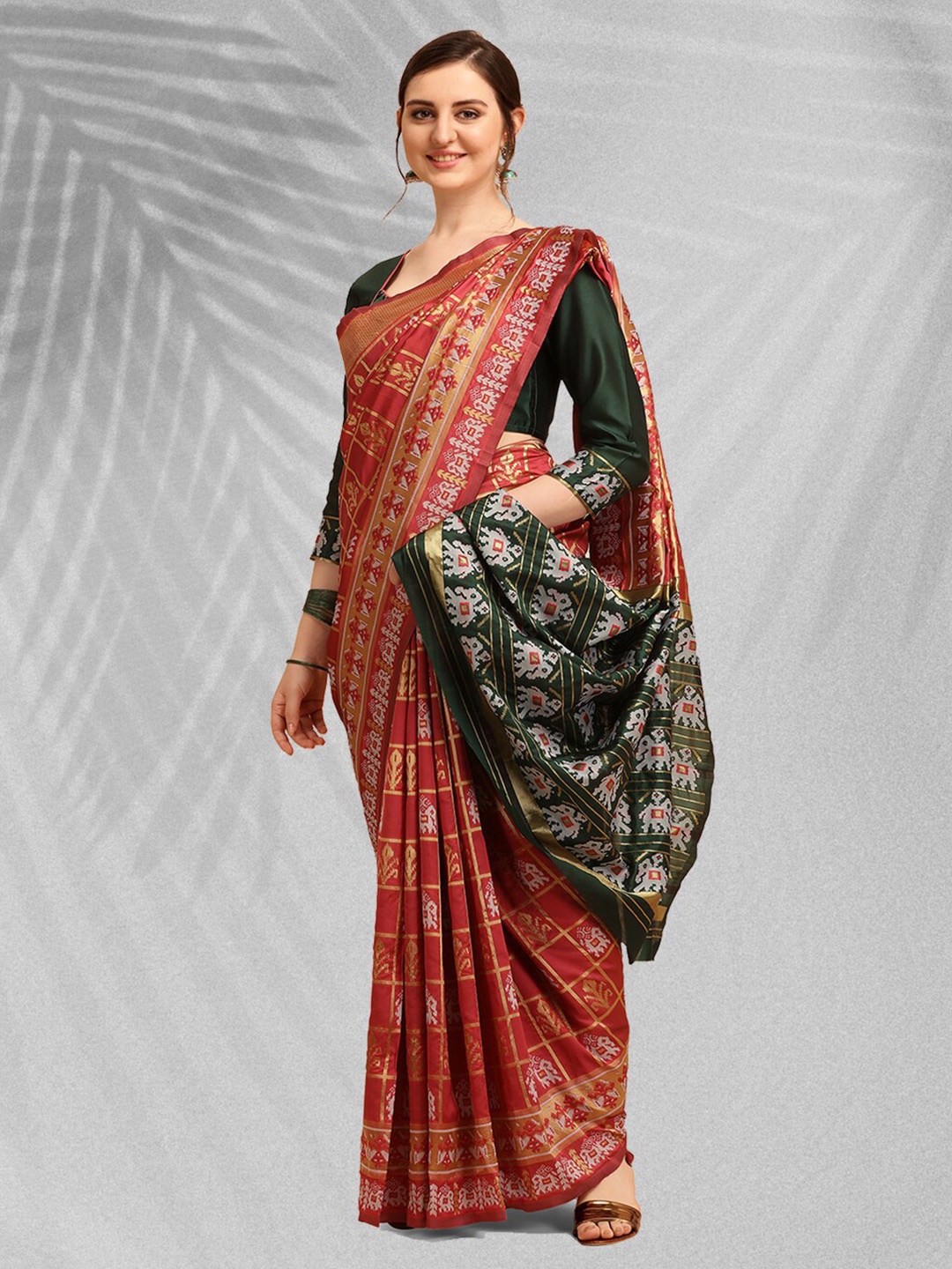 

Mitera Red & Green Ethnic Motifs Woven Design Zari Silk Cotton Patola Saree