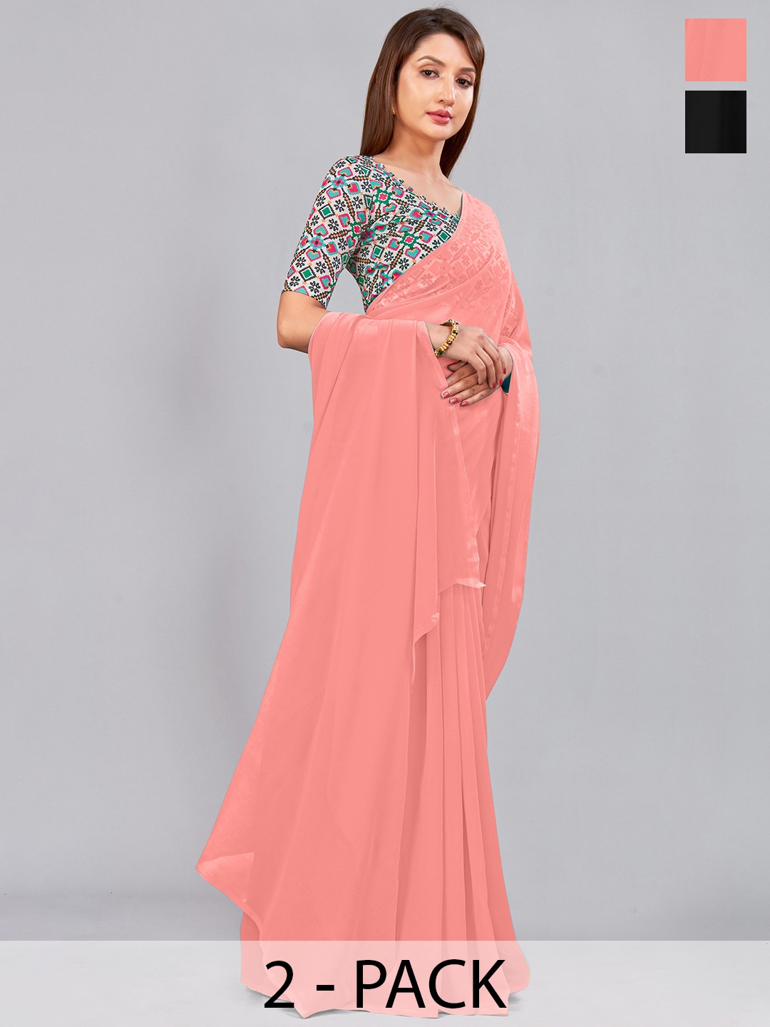 

CastilloFab Peach Coloured & Black Selection of 2 Pure Georgette Sarees