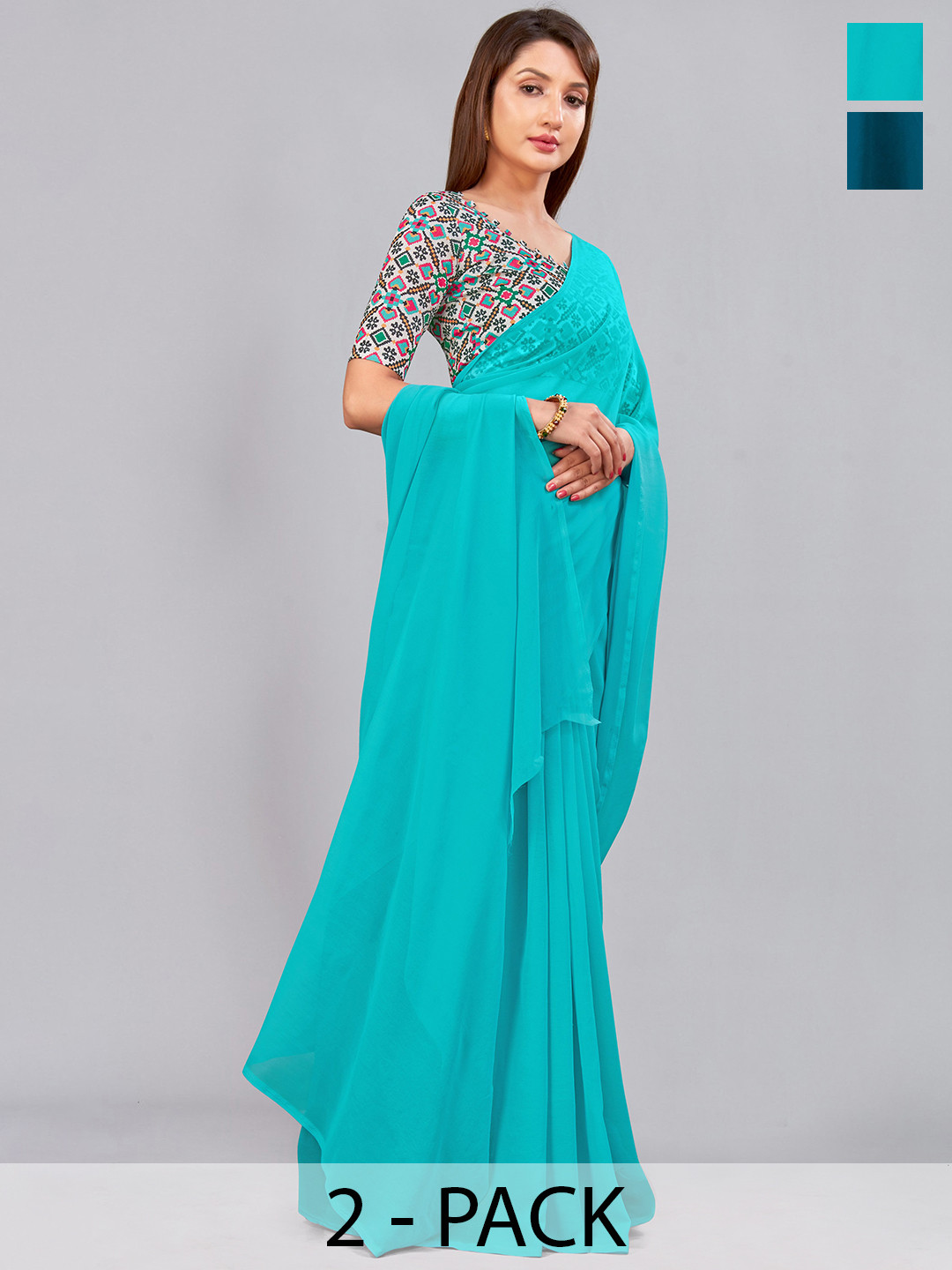 

CastilloFab Turquoise Blue & Teal Selection of 2 Pure Georgette Sarees