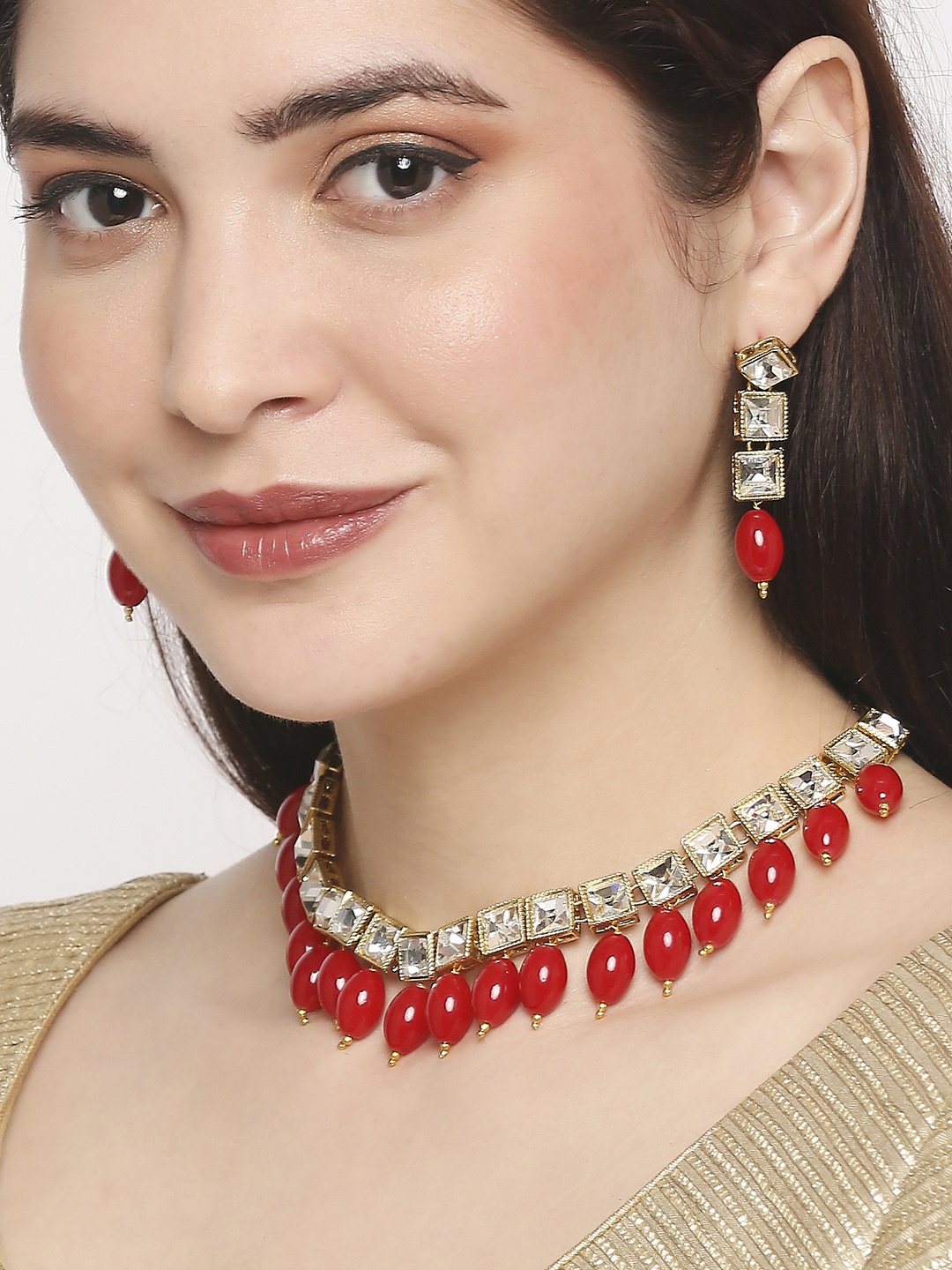 

OOMPH kundan Studded Jewellery Set, Gold