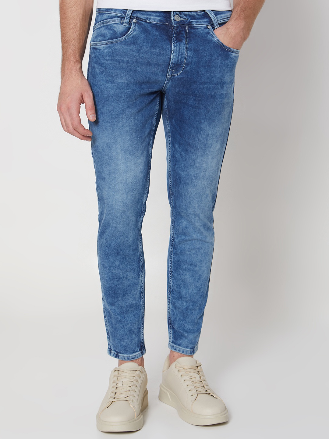 

Mufti Men Blue Tapered Fit Heavy Fade Clean Look Whiskers & Chevrons Stretchable Jeans