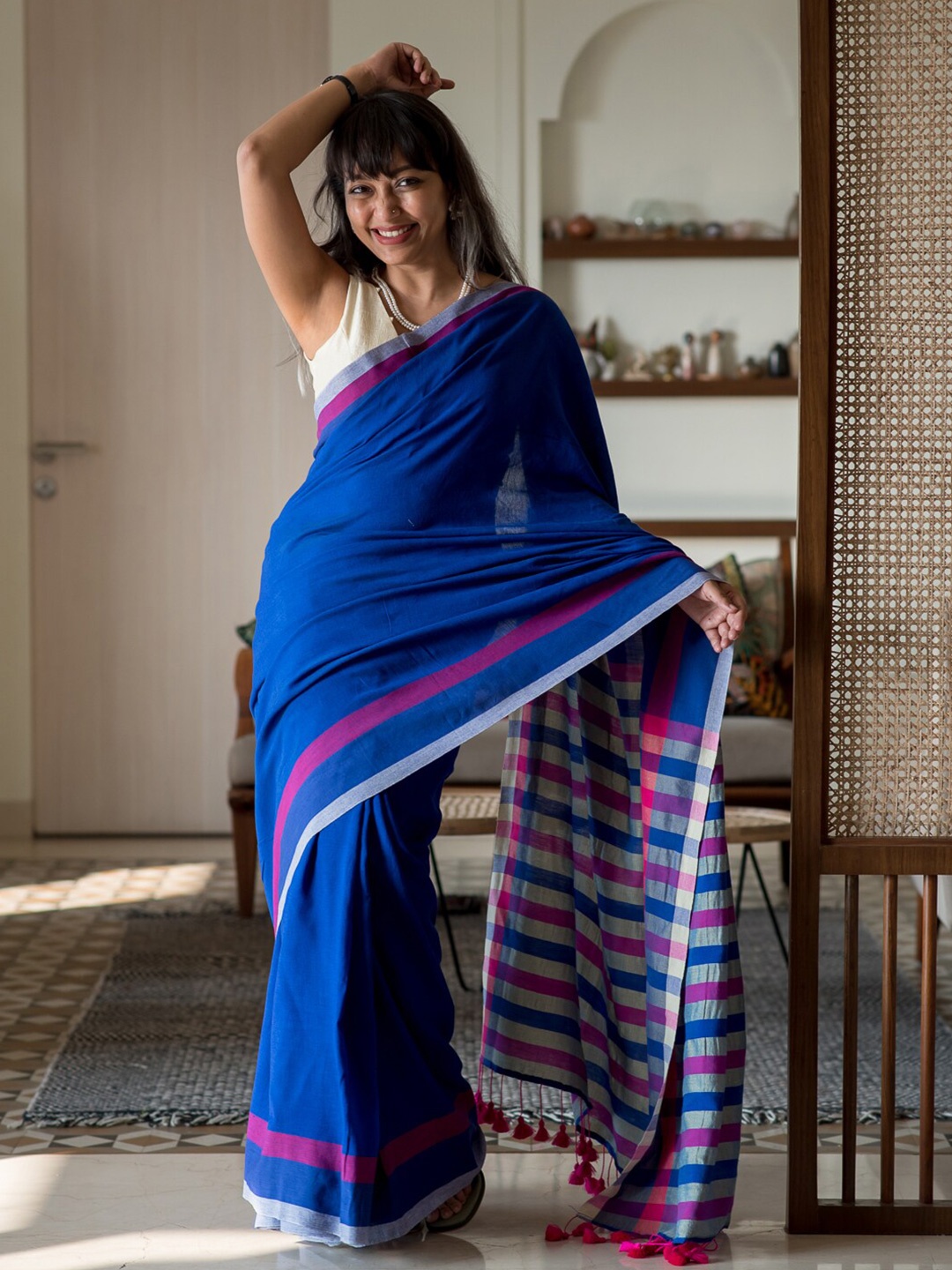 

Suta Blue & Pink Cotton Blend Saree