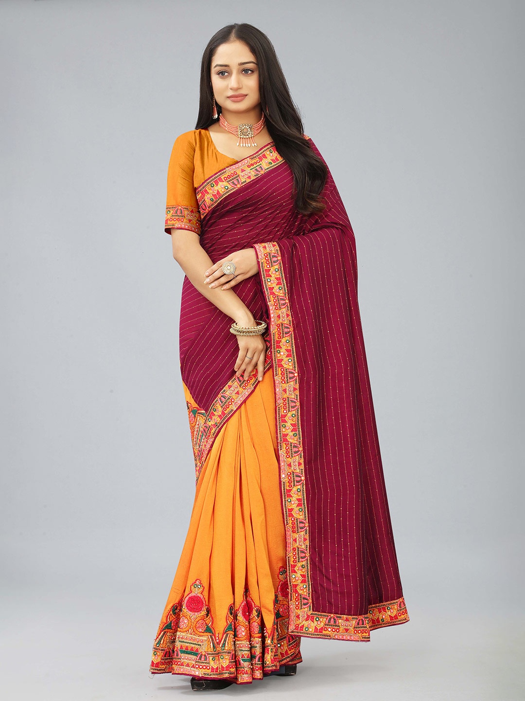 

Hinaya Maroon & Yellow Striped Sequinned Half and Half Saree