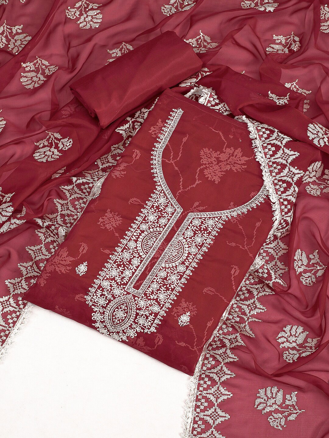 

Inddus Maroon Floral Embroidered Sequinned Unstitched Dress Material