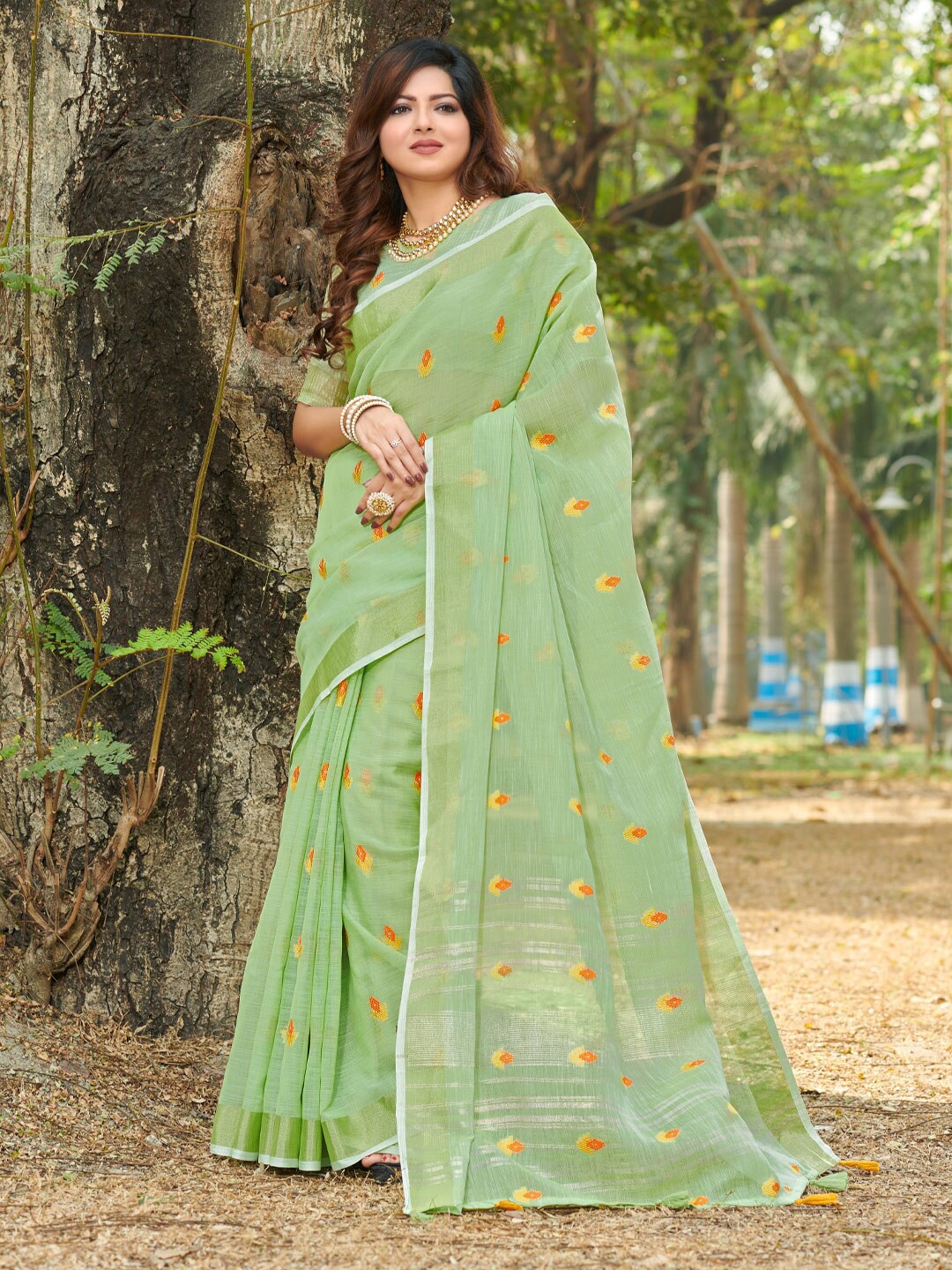 

Mitera Green & Orange Floral Zari Linen Saree