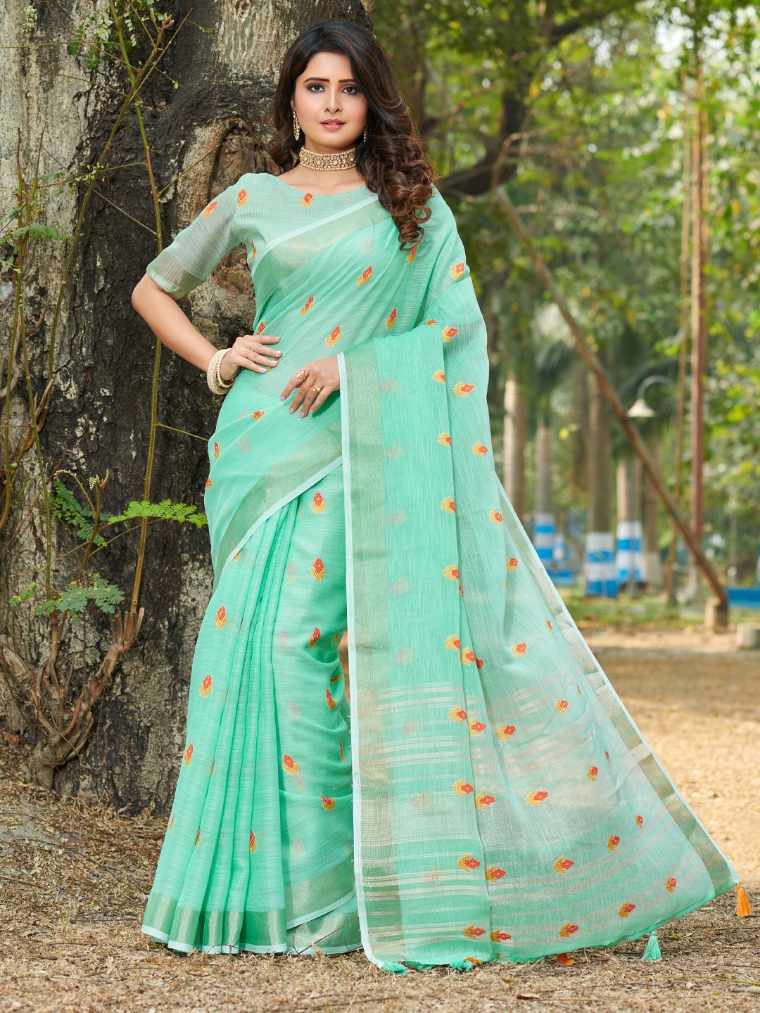 

Mitera Sea Green & Yellow Ethnic Motifs Embroidered Linen Saree