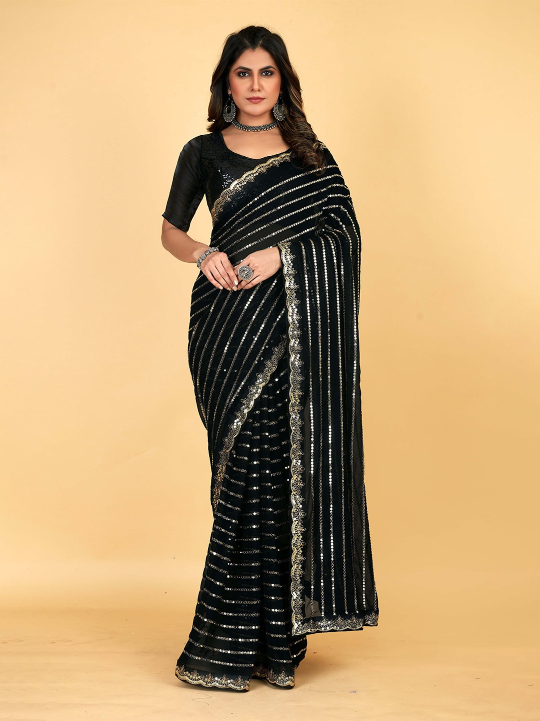 

Mitera Black & GoldToned Embellished Sequinned Georgette Saree
