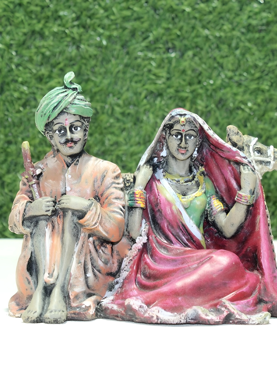 

Vikarafty Green & Pink Figurine Showpiece