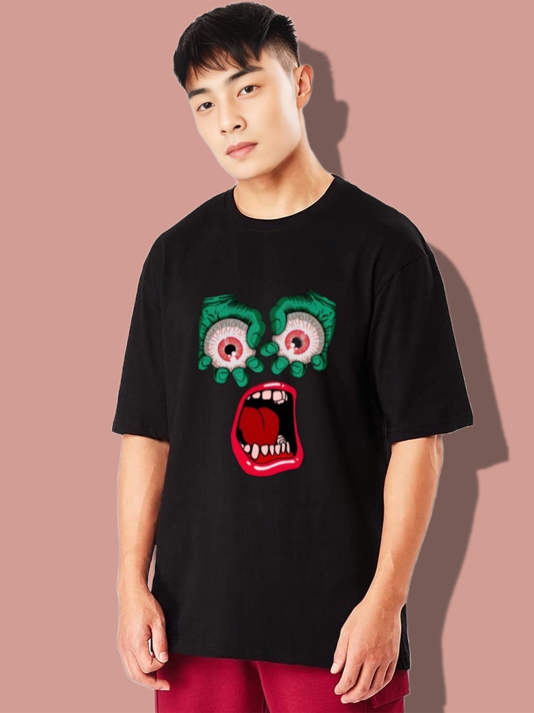 

Elibolz Monster Eyes Printed Oversized Cotton Colourblocked Extended Sleeves Tshirt, Black