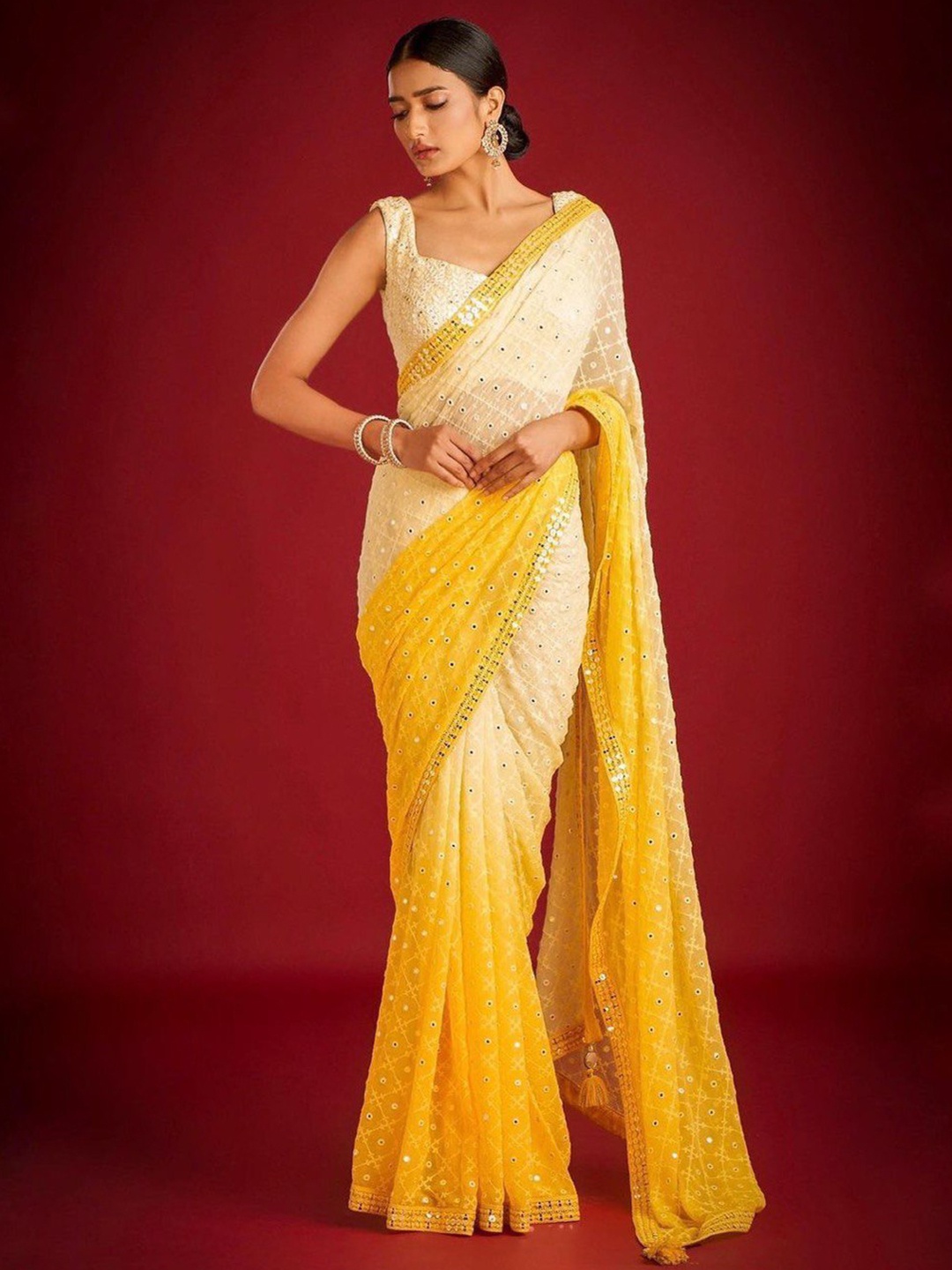 

Jinal & Jinal Yellow & White Embroidered Half and Half Saree