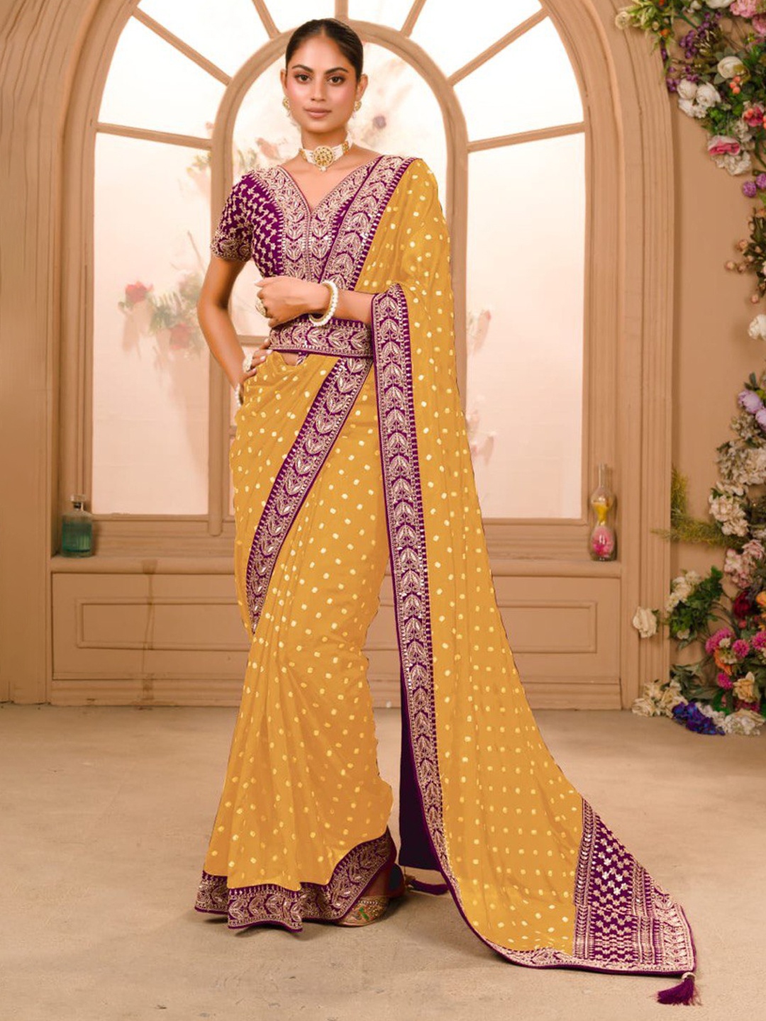 

Jinal & Jinal Yellow & White Bandhani Printed Embroidered Saree