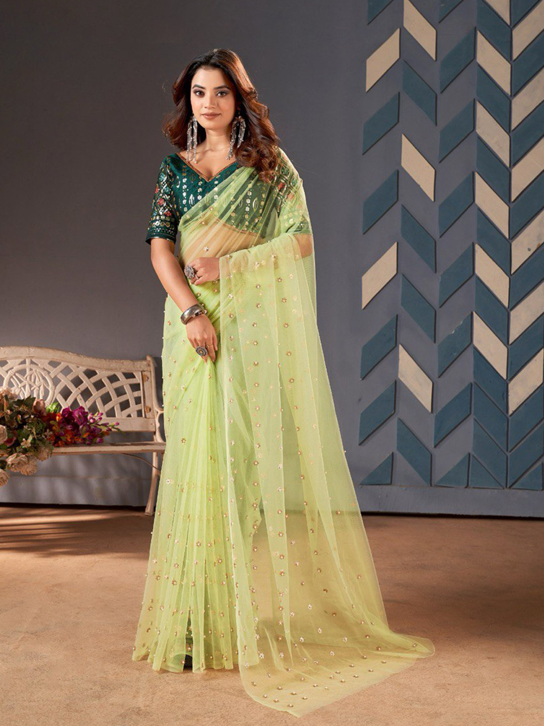 

Jinal & Jinal Green Embellished Beads and Stones Net Saree