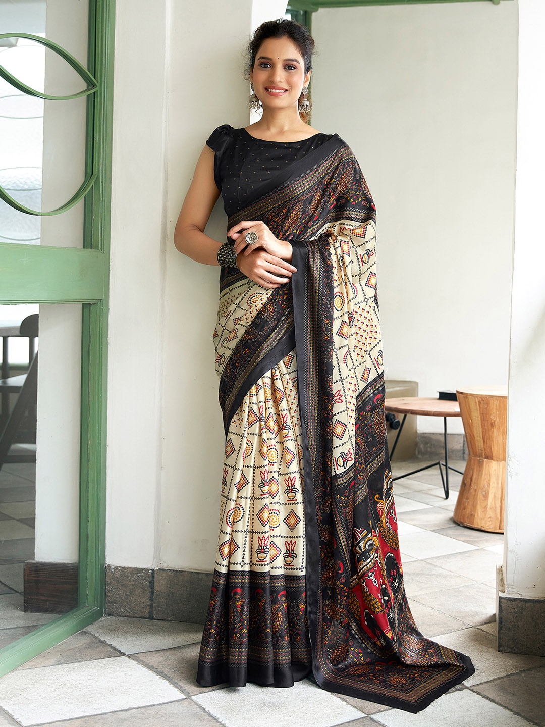

Satrani Ethnic Motifs Printed Patola Saree, Cream