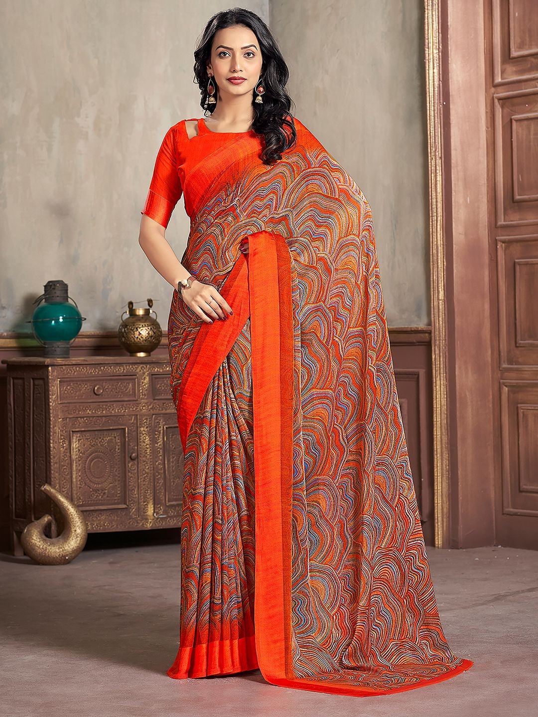 

Mitera Orange & Blue Printed Chiffon Saree