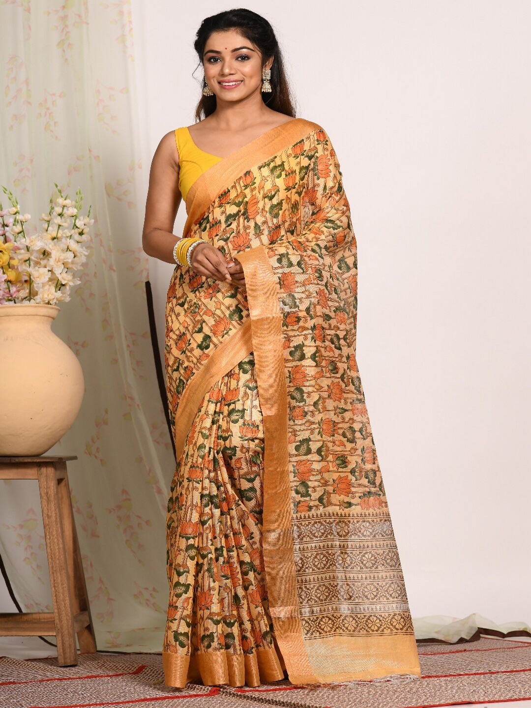 

Morchari Peach-Coloured & Green Floral Printed Zari Tissue Saree