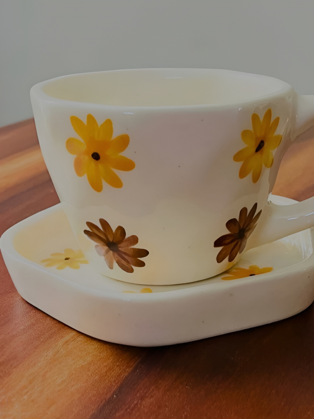 

Your Local Store White & Yellow 2 Pieces Printed Ceramic Glossy Cups and Saucers 230 ml