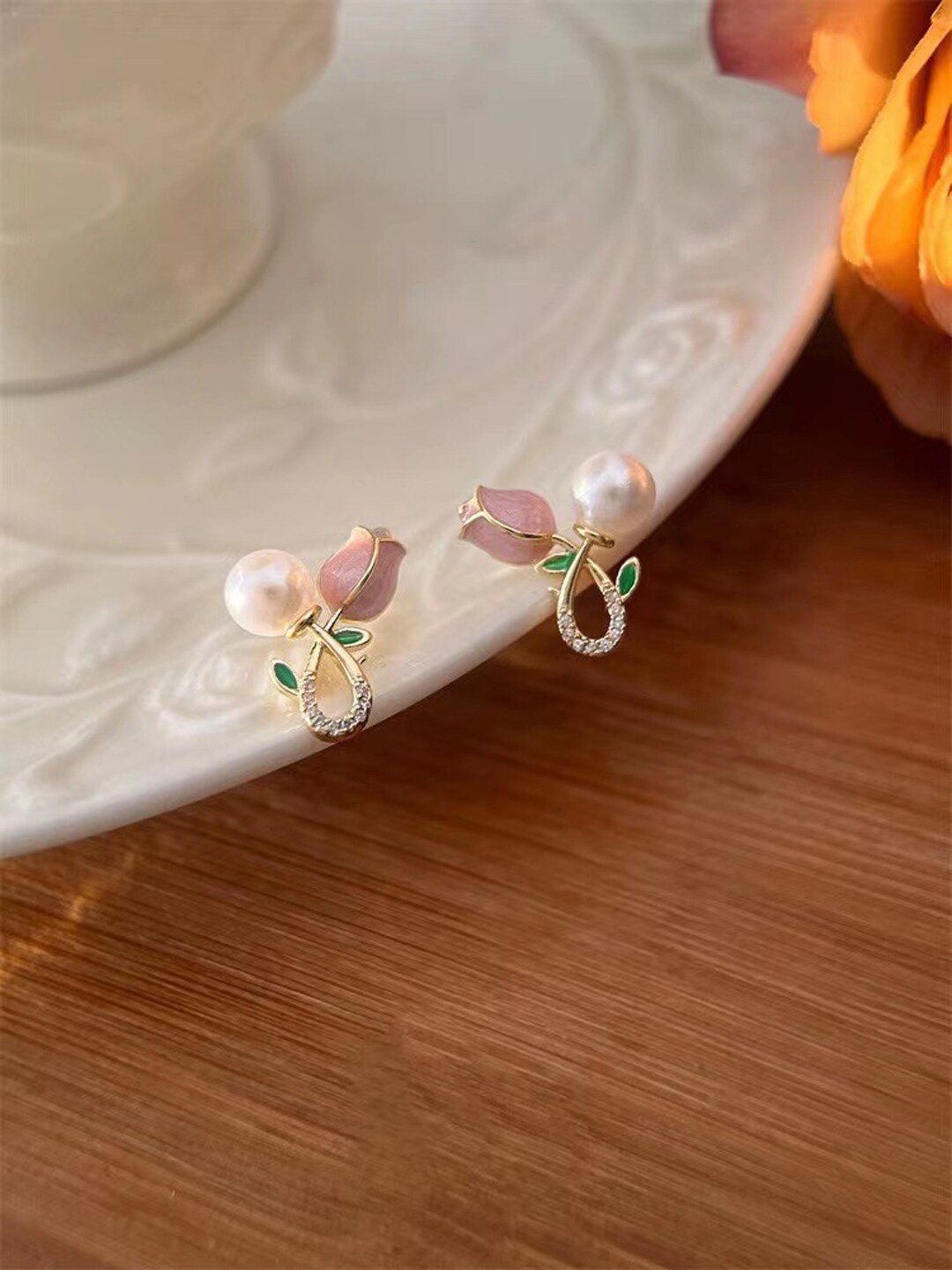 

Krelin Gold-Plated Stones Stainless Steel Studded Floral Studs Earrings