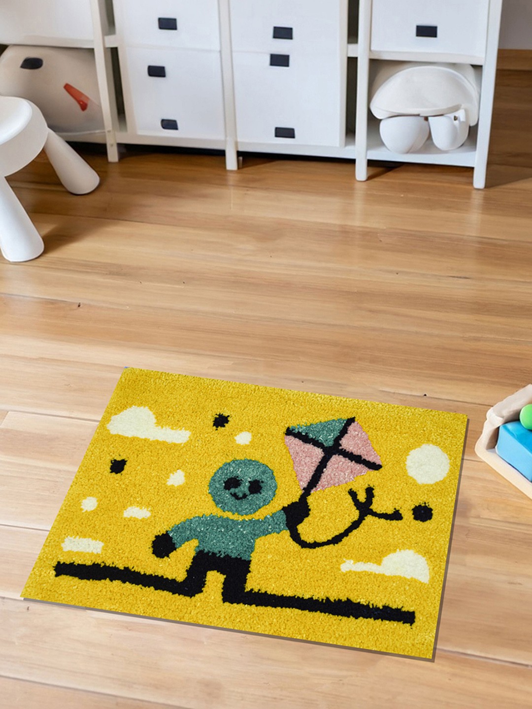 

Rangoli Yellow Cartoon Printed Anti Skid Tuffted Kids Room Rug | 40 x 60 cm