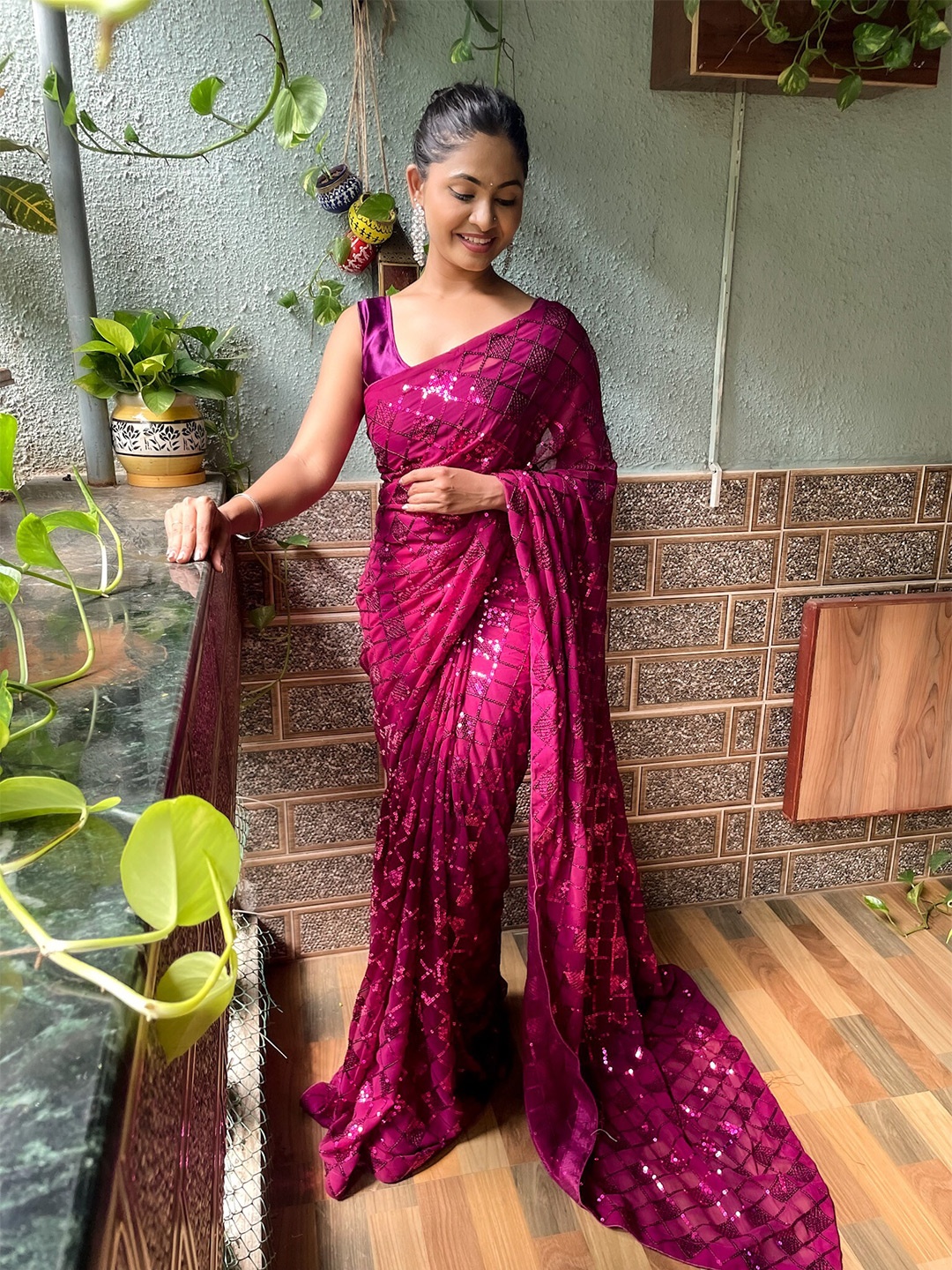 

Kalista Purple Embellished Sequinned Pure Georgette Saree