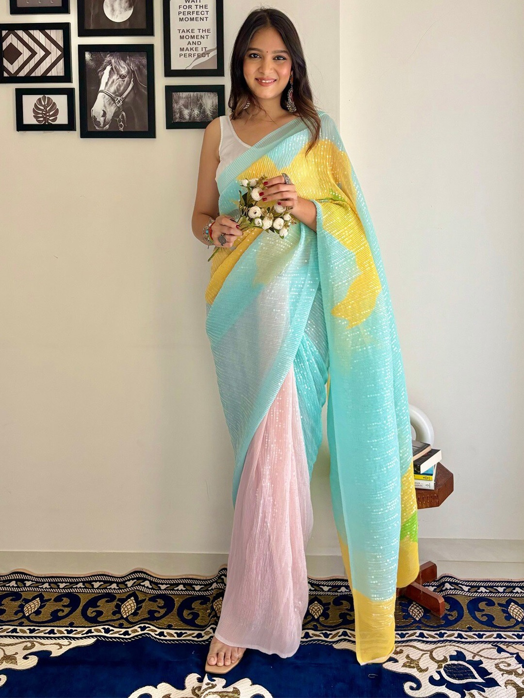 

Kalista Blue & Yellow Embellished Sequinned Pure Georgette Designer Saree