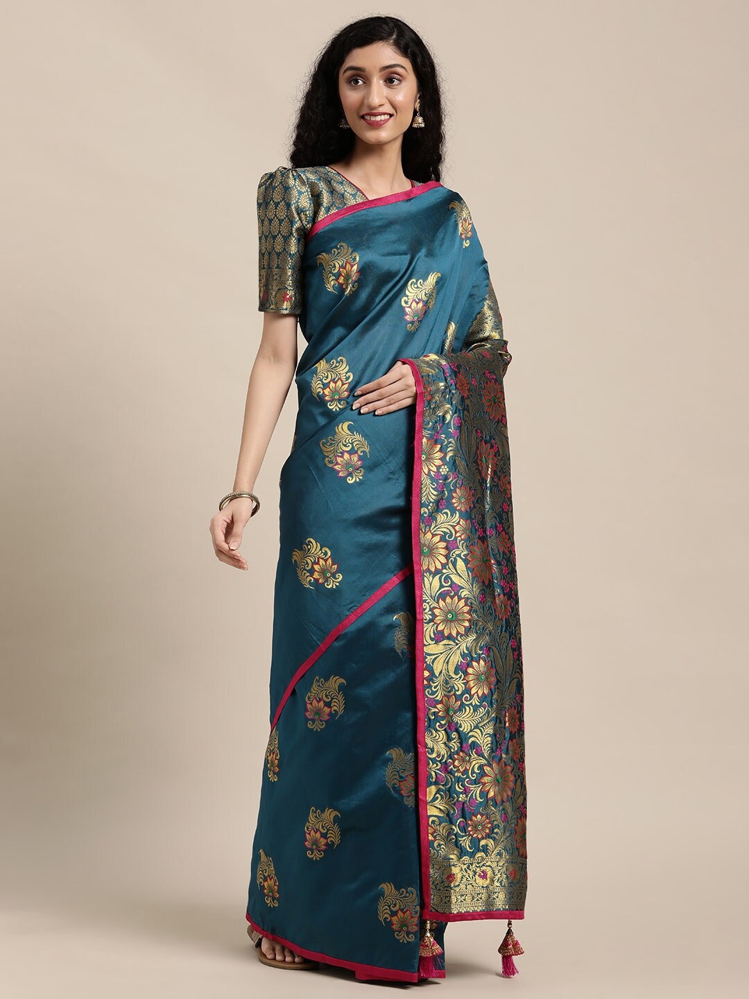 

Mitera Turquoise Blue & Gold-Toned Ethnic Motifs Zari Heavy Work Banarasi Saree