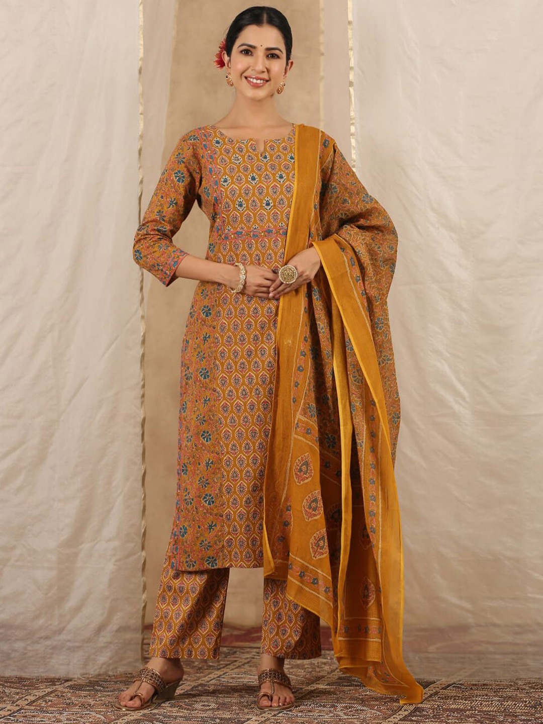 

Meena Bazaar Floral Printed Round Neck Regular Kurta With Trousers & Dupatta, Mustard