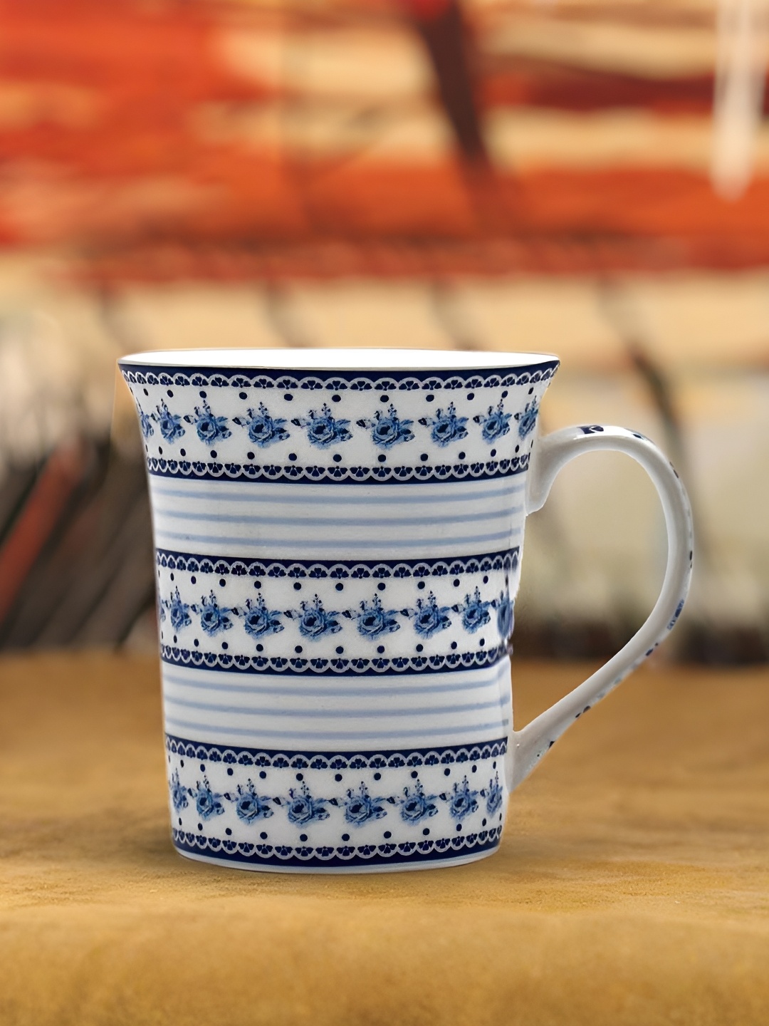 

Kookee White and Blue Printed Ceramic Mugs 325 ml