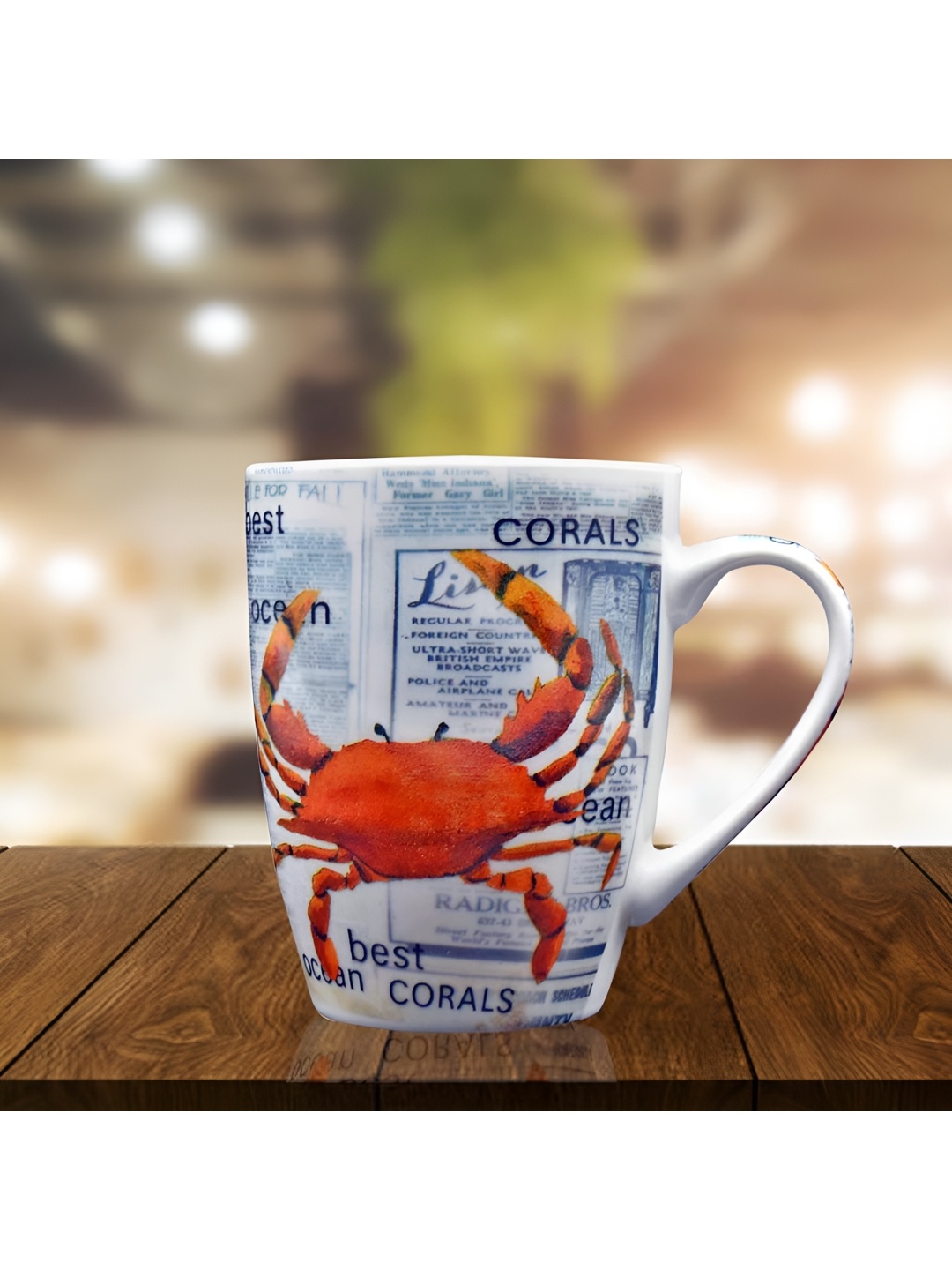 

Kookee Orange and White Printed Ceramic Mugs 325 ml