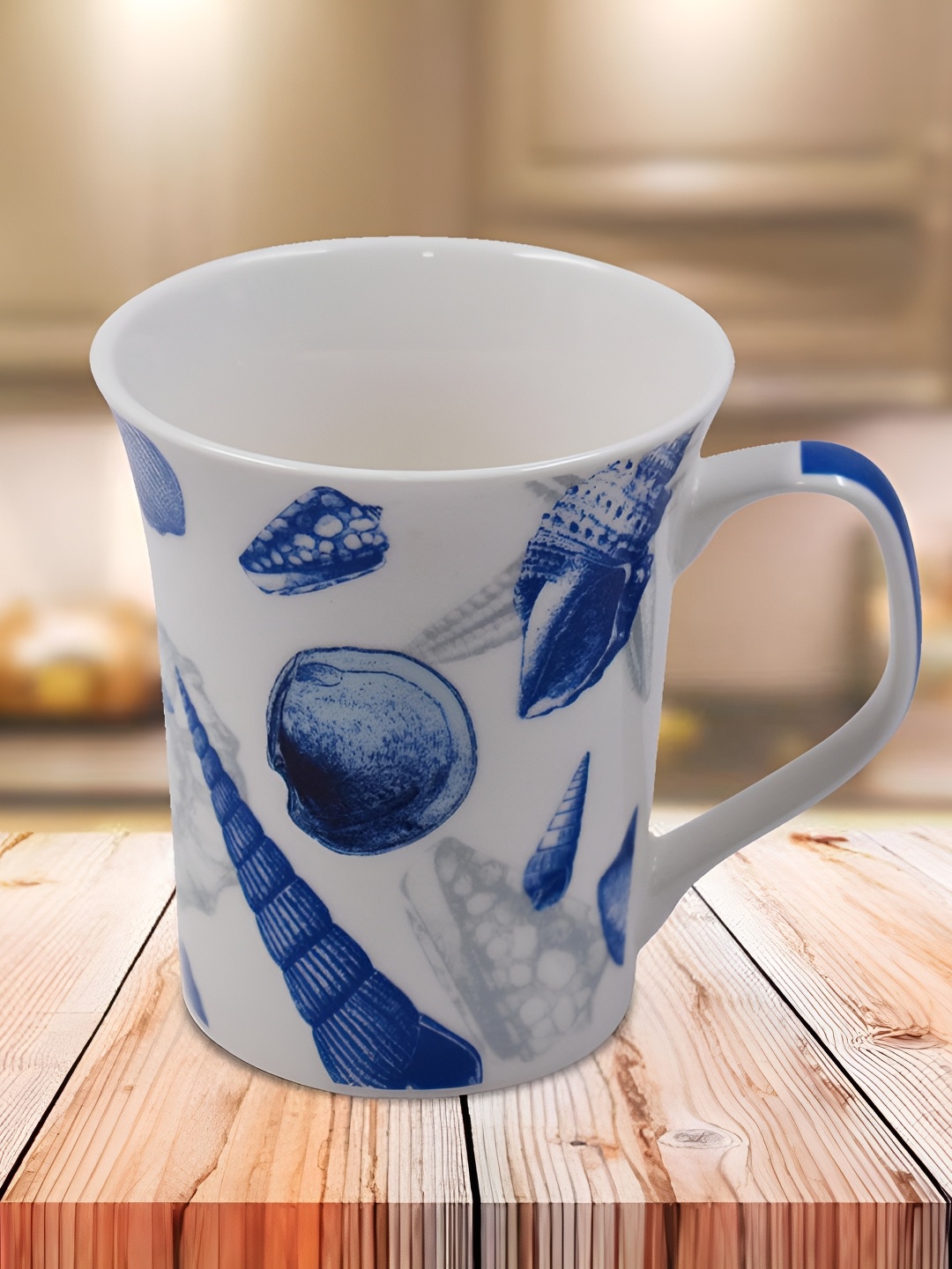 

Kookee White and Blue Printed Ceramic Mugs 325 ml