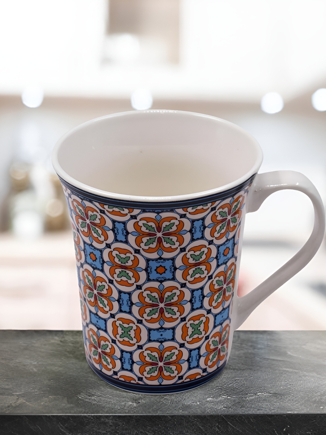 

Kookee Blue and Orange Printed Ceramic Mugs 325 ml
