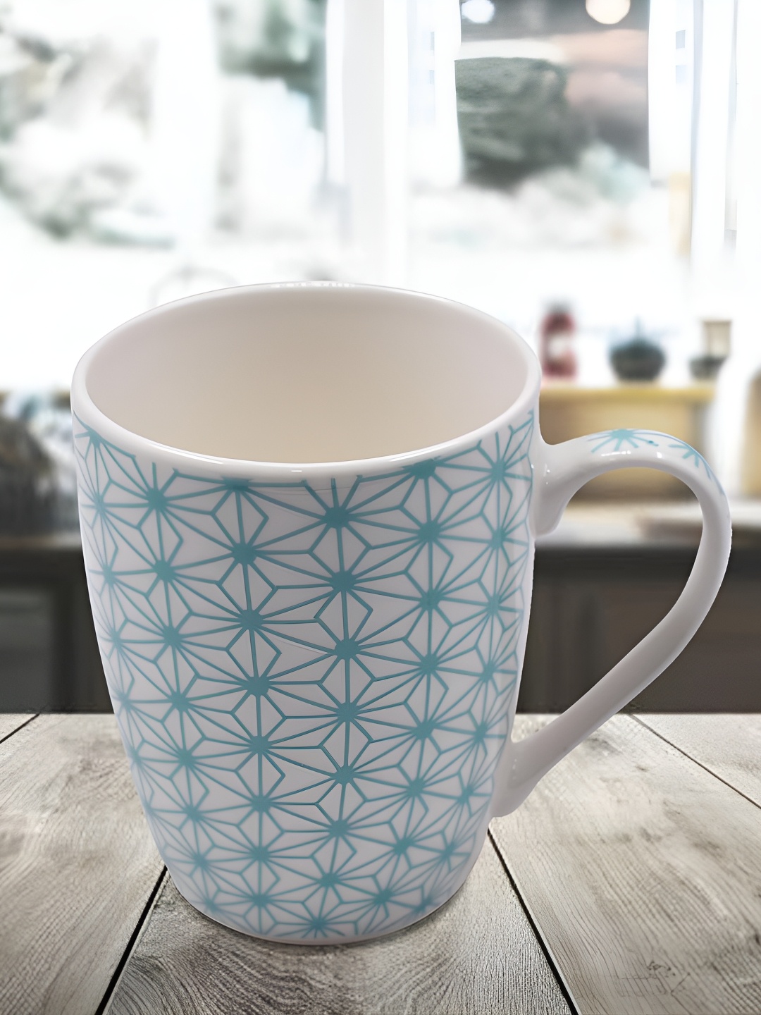

Kookee White and Blue Printed Ceramic Mugs 325 ml